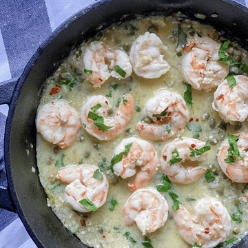 summer shrimp piccata in a cast iron skillet