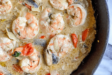 Paleo Tuscan Shrimp in a cast Iron pan