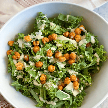 dairy-free caesar salad in a bowl with kale and chickpeas