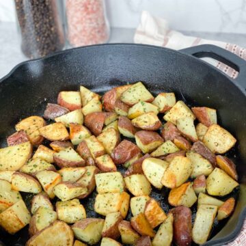 Oven-Roasted potatoes in a cast iron pan