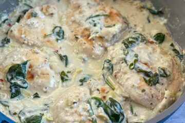Creamy artichoke chicken in a pan