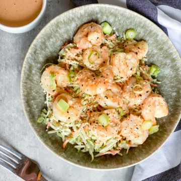 Bang Bang shrimp over slaw in a bowl