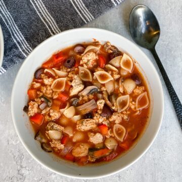 Pizza soup in a white bowl